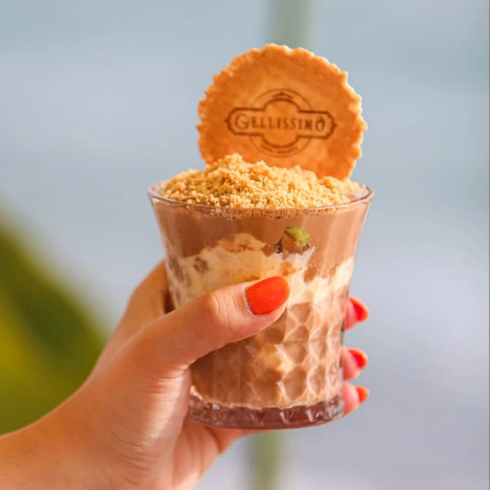 Hand holding ice cream lava