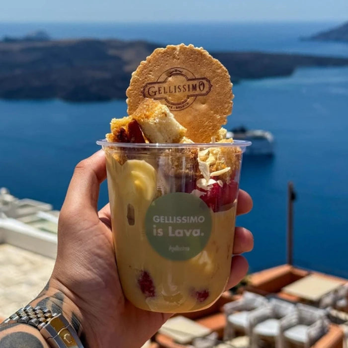 Hand holding cup of ice cream lava